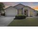Charming single-story home with a well-manicured lawn and inviting front entrance at 6742 W El Cortez Pl, Peoria, AZ 85383