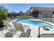 The private backyard pool and lounge chairs provide a perfect spot for outdoor relaxation at 6742 W El Cortez Pl, Peoria, AZ 85383