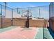 The community sports court is surrounded by a chain link fence at 7110 E Continental Dr # 2008, Scottsdale, AZ 85257