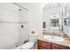 Stylish bathroom features a walk-in shower and a vanity with granite countertops at 7110 E Continental Dr # 2008, Scottsdale, AZ 85257