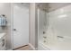 Bathroom featuring a tub-shower combo and stylish fixtures, creating a functional and comfortable space at 7220 E Edgewood Ave, Mesa, AZ 85208