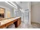 Well-lit bathroom features a vanity with ample counter space and a glass-enclosed shower at 7236 W Townley Ave, Peoria, AZ 85345