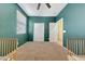 Spacious bedroom with two closets and a window letting in natural light at 7236 W Townley Ave, Peoria, AZ 85345