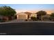 Charming single-Gathering home with a two-car garage, desert landscaping, and mountain views at 7973 S Peppertree Ct, Gilbert, AZ 85298