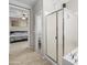 Bathroom includes a walk-in shower, tile flooring, and direct access to an adjacent bedroom and toilet at 9132 S Parkside Dr, Tempe, AZ 85284