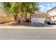 Beautiful two-story home with a well-maintained yard, two car garage, and a welcoming entrance at 9132 S Parkside Dr, Tempe, AZ 85284