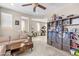 Comfortable living room with neutral paint, plush sofa, and built-in shelves for storage and decor at 9132 S Parkside Dr, Tempe, AZ 85284