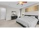 Comfortable bedroom with a large bed, dresser, and soft carpet at 9132 S Parkside Dr, Tempe, AZ 85284