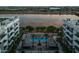 Aerial view of complex with pool, offering a resort-style living experience near the water at 945 E Playa Del Norte Dr # 1022, Tempe, AZ 85288