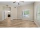 Bright bedroom with wood flooring and a large window, awaiting personal touches and decor at 945 E Playa Del Norte Dr # 1022, Tempe, AZ 85288