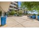 Exterior view of landscaped courtyard with potted plants and building at 945 E Playa Del Norte Dr # 1022, Tempe, AZ 85288
