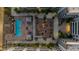 Overhead shot of a community courtyard featuring a pool, desert landscaping, and lounge areas at 945 E Playa Del Norte Dr # 1022, Tempe, AZ 85288