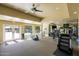Bright gym featuring a variety of fitness equipment including treadmills, elliptical machines, and weight machines at 945 E Playa Del Norte Dr # 1022, Tempe, AZ 85288