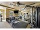 Well-equipped gym with weights, machines, mirrors, and ceiling fans for a complete workout experience at 945 E Playa Del Norte Dr # 1022, Tempe, AZ 85288