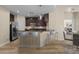 Kitchen with bar stool seating at the breakfast bar that overlooks the dining area at 945 E Playa Del Norte Dr # 1022, Tempe, AZ 85288