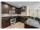 Modern kitchen with stainless steel appliances and granite countertops, perfect for the home chef at 945 E Playa Del Norte Dr # 1022, Tempe, AZ 85288