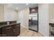 Spacious kitchen boasts stainless steel refrigerator and plenty of cabinet storage at 945 E Playa Del Norte Dr # 1022, Tempe, AZ 85288
