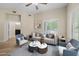 Sun-filled living room boasts stylish furniture and modern decor creating a welcoming space at 945 E Playa Del Norte Dr # 1022, Tempe, AZ 85288