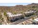 Aerial view of a modern apartment complex nestled against a scenic mountain backdrop, offering stunning desert views at 9820 N Central Ave # 307, Phoenix, AZ 85020