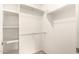 A walk-in closet with shelving provides ample storage space, perfect for organization at 9820 N Central Ave # 307, Phoenix, AZ 85020