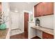 Charming entryway with a built-in desk and storage cabinets at 9820 N Central Ave # 307, Phoenix, AZ 85020
