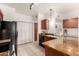 Functional kitchen featuring granite countertops, ample cabinets, and modern appliances at 9820 N Central Ave # 307, Phoenix, AZ 85020