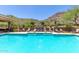 The community pool and lounging area provide a cool retreat during hot days at 9820 N Central Ave # 307, Phoenix, AZ 85020