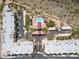 Overhead shot of community featuring residential buildings, pool, parking, and landscaping at 9820 N Central Ave # 324, Phoenix, AZ 85020