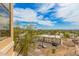 View from balcony with a view of the city, clear skies, and some greenery at 9820 N Central Ave # 324, Phoenix, AZ 85020