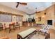 Community common area featuring a fireplace, bar seating, and lounge area at 9820 N Central Ave # 324, Phoenix, AZ 85020
