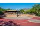 Community basketball court with mountain views, playground and covered picnic area nearby at 9865 E Piedra Dr, Scottsdale, AZ 85255
