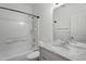 Bathroom area featuring tub, shower, toilet and vanity with granite countertop at 10152 E Knowles Ave, Mesa, AZ 85209