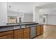 Eat-in kitchen featuring stainless steel appliances, and views to the Living area at 10152 E Knowles Ave, Mesa, AZ 85209