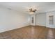 Bright living room with tile floors, neutral walls, and a ceiling fan at 10152 E Knowles Ave, Mesa, AZ 85209