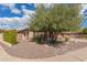 Charming single-story home featuring desert landscaping and an inviting front facade with lots of curb appeal at 104 E Louis Way, Tempe, AZ 85284
