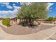 Charming single-story home featuring desert landscaping and an inviting front facade with lots of curb appeal at 104 E Louis Way, Tempe, AZ 85284