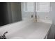 Well-lit bathroom features a vanity, mirror, and sleek countertops at 11011 N 92Nd St # 1096, Scottsdale, AZ 85260