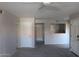 Neutral tones throughout living room offers versatile space with a pass-through to the kitchen at 11011 N 92Nd St # 1096, Scottsdale, AZ 85260