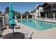 The community pool offers a relaxing retreat with lounge chairs and shade umbrellas at 11011 N 92Nd St # 1096, Scottsdale, AZ 85260