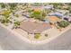 Stunning aerial view of the well-maintained home showcasing its landscaped surroundings at 1156 E Brenda Dr, Casa Grande, AZ 85122