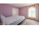 Cozy bedroom with a large window and closet at 1156 E Brenda Dr, Casa Grande, AZ 85122