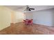 Cozy dining area with ceiling fan, tile flooring, and bright walls at 1156 E Brenda Dr, Casa Grande, AZ 85122