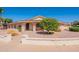 Charming single-story home featuring a xeriscaped yard with a mature citrus tree in a sunny setting at 1156 E Brenda Dr, Casa Grande, AZ 85122