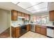 Functional kitchen featuring matching appliances and tile flooring at 1156 E Brenda Dr, Casa Grande, AZ 85122
