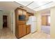 Efficient kitchen design with cabinetry, appliances and tile flooring at 1156 E Brenda Dr, Casa Grande, AZ 85122