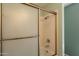 A close-up shot of a shower-tub combo at 1156 E Brenda Dr, Casa Grande, AZ 85122