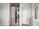 Bathroom featuring a glass-enclosed shower, vanity, and ample lighting at 11785 N 143Rd Dr, Surprise, AZ 85379