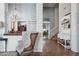 Formal dining room with chandelier, elegant decor, and open access to other areas at 11785 N 143Rd Dr, Surprise, AZ 85379