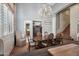 Dining room with views to the kitchen, living areas, and staircase at 11785 N 143Rd Dr, Surprise, AZ 85379