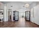 Bright entryway featuring tile flooring, high ceilings, and views to other rooms at 11785 N 143Rd Dr, Surprise, AZ 85379